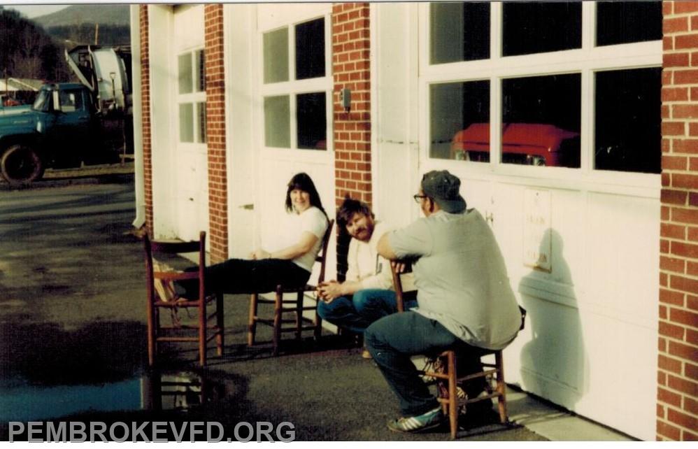 Past President Harvey Kirk talking with friends