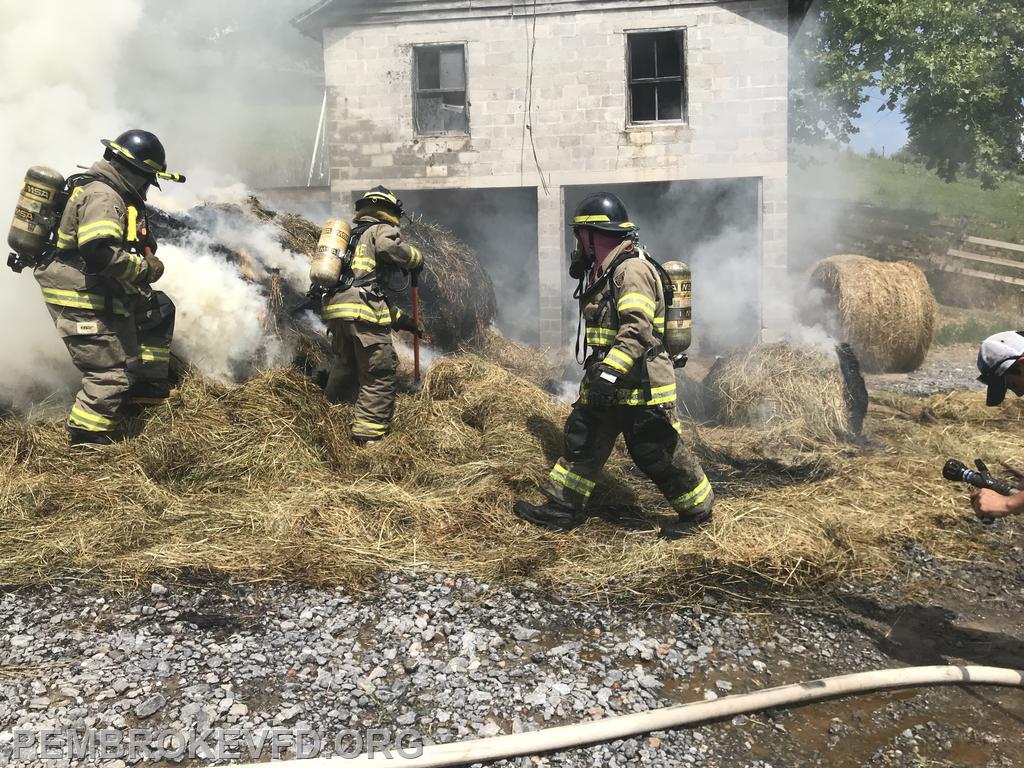Hay and hay trailer fire