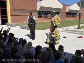 SRO Jennings talking to the kids about fire safety